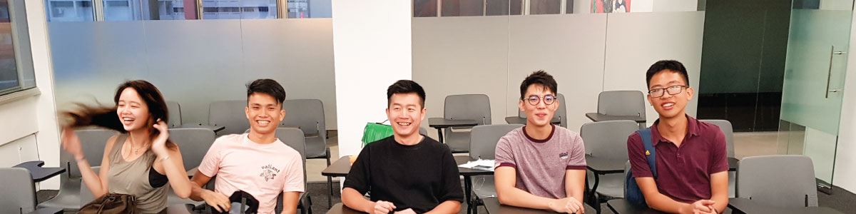 Jack Ng with students at Achevas H2 Math Tuition Center